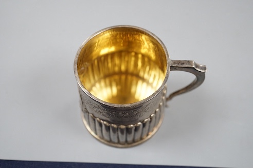 A George IV demi-fluted silver christening mug, with later engraved inscription, London, 1823, 69mm.